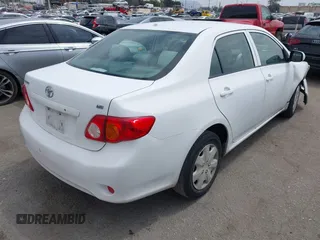 2010 Toyota Corolla with VIN JTDBU4EE6AJ063009, listed as a IAAI auction lot 42034688 with 168,643 mi miles. Bid and sale history available at carsss.com. Image 4.