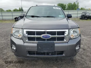 2011 Ford Escape XLT с VIN 1FMCU0D71BKC40590, выставлен на аукционе Copart как лот 58641865 с пробегом 95 211 миль миль и Списание • Salvage title. История ставок и продаж доступна на DreamBid. Изображение 5.