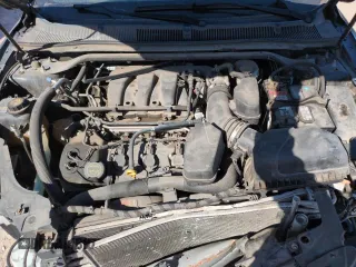 2015 Ford Taurus Limited with VIN 1FAHP2F85FG177916, listed as a Copart auction lot 49004365 with 129,486 mi miles and Salvage Title. Bid and sale history available at DreamBid. Image 11.