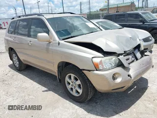 2006 Toyota Highlander w/3rd Row with VIN JTEDD21A660144990, listed as a IAAI auction lot 42590461 with 127,372 mi miles and . Bid and sale history available at DreamBid. Image 1.