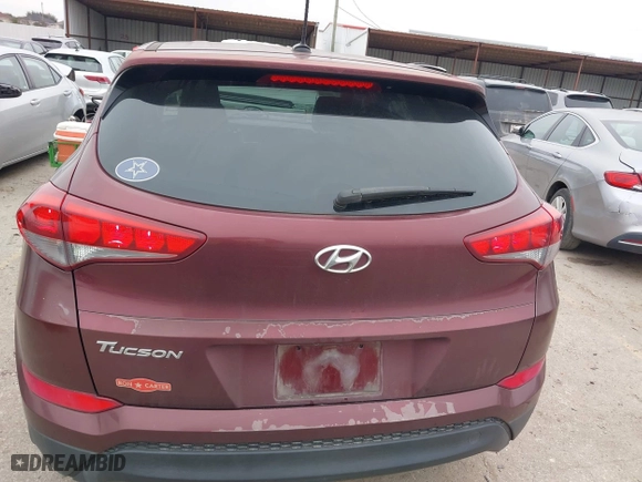 2016 Hyundai Tucson SE with VIN KM8J23A4XGU041915, listed as a IAAI auction lot 41573038 with 101,937 mi miles. Bid and sale history available at carsss.com. Image 16.