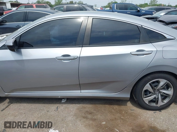 2019 Honda Civic LX with VIN 19XFC2F66KE026931, listed as a IAAI auction lot 41885137 with 55,057 mi miles and . Bid and sale history available at DreamBid. Image 14.