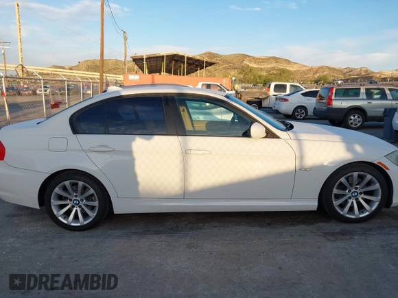2011 BMW 3 Series 328i with VIN WBAPH5G57BNM76870, listed as a IAAI auction lot 41900288 with 191,609 mi miles and . Bid and sale history available at carsss.com. Image 13.