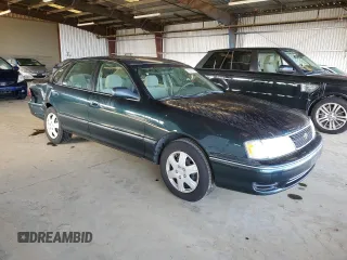1998 Toyota Avalon XL with VIN 4T1BF18B1WU265039, listed as a Copart auction lot 52356785 with 375,814 mi miles and Salvage Title. Bid and sale history available at DreamBid. Image 4.