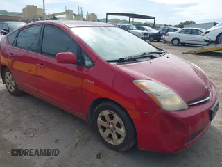 2007 Toyota Prius z VIN JTDKB20U877601207, wystawiony jako IAAI lot #41870158 z przebiegiem 218 955 mil mil oraz . Historia ofert i sprzedaży dostępna na DreamBid. Obrazek 1.