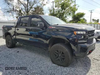 2021 Chevrolet Silverado 1500 LT Trail Boss with VIN 3GCPYFEL8MG113421, listed as a Copart auction lot 54844915 with 133,470 mi miles and Clean Title. Bid and sale history available at DreamBid. Image 4.