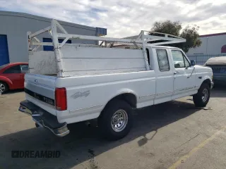 1992 Ford F-150 with VIN 1FTEX14N3NKB14423, listed as a Copart auction lot 77404624 with 287,507 mi miles and Salvage Title. Bid and sale history available at carsss.com. Image 3.