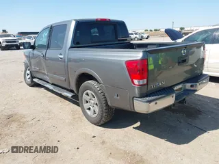 2015 Nissan Titan SV z VIN 1N6BA0ED5FN508975, wystawiony jako IAAI lot #42032737 z przebiegiem 97 432 mil mil oraz . Historia ofert i sprzedaży dostępna na DreamBid. Obrazek 3.