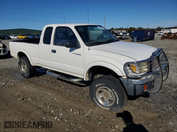1999 Toyota Tacoma PreRunner with VIN 4TASM92N0XZ559544, listed as a Copart auction lot 86626024 with 209,794 mi miles and Salvage title. Bid and sale history available at DreamBid. Image 4.
