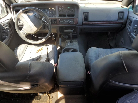 1998 Jeep Grand Cherokee Laredo with VIN 1J4GZ58Y4WC109610, listed as a Copart auction lot 58705124 with 247,990 mi miles and Salvage Title. Bid and sale history available at carsss.com. Image 8.