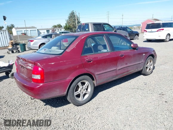 2003 Mazda Protege DX with VIN JM1BJ225930195479, listed as a IAAI auction lot 42199689 with 148,382 mi miles and . Bid and sale history available at DreamBid. Image 4.