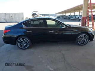 2014 Infiniti Q50 Premium with VIN JN1BV7AP9EM688811, listed as a IAAI auction lot 41483058 with 95,204 mi miles and . Bid and sale history available at DreamBid. Image 13.