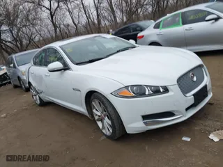 2015 Jaguar XF V6 Portfolio with VIN SAJWJ0FF2F8U59934, listed as a IAAI auction lot 41558305 with 120,219 mi miles. Bid and sale history available at carsss.com. Image 1.