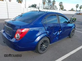 2013 Chevrolet Sonic LT with VIN 1G1JC5SB2D4147595, listed as a IAAI auction lot 41643641 with 83,538 mi miles and . Bid and sale history available at DreamBid. Image 4.