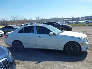 2012 Mercedes-Benz E-Class E 350 Luxury with VIN WDDHF8JB4CA651569, listed as a IAAI auction lot 41769849 with 150,074 mi miles. Bid and sale history available at carsss.com. Image 13.