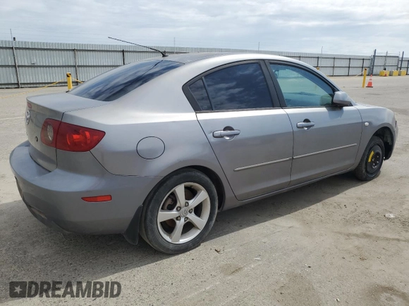 2006 Mazda 3 i with VIN JM1BK12F861415998, listed as a Copart auction lot 48617885 with 252,508 mi miles and Clean Title. Bid and sale history available at DreamBid. Image 3.
