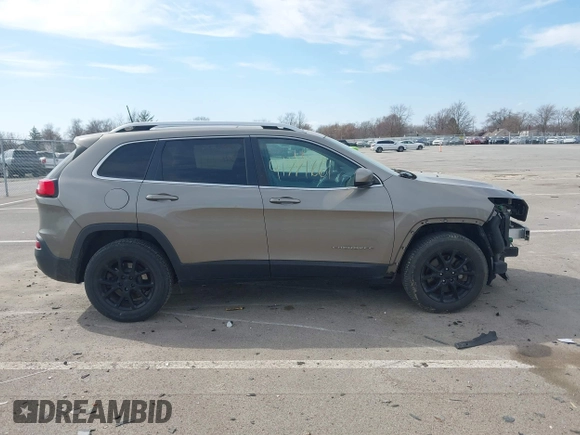2018 Jeep Cherokee Latitude Plus with VIN 1C4PJMLXXJD571713, listed as a IAAI auction lot 41771661 with 87,580 mi miles and . Bid and sale history available at DreamBid. Image 14.