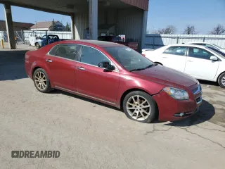 2011 Chevrolet Malibu LTZ with VIN 1G1ZE5E79BF206860, listed as a Copart auction lot 48797055 with 220,059 mi miles and Salvage Title. Bid and sale history available at DreamBid. Image 4.