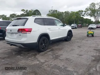 2018 Volkswagen Atlas SEL with VIN 1V2MR2CA9JC572206, listed as a IAAI auction lot 41995114 with 64,324 mi miles and . Bid and sale history available at DreamBid. Image 4.