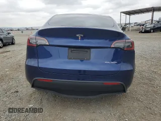 2024 Tesla Model Y Long Range with VIN 7SAYGDEE0RF176672, listed as a Copart auction lot 55622355 with 6,728 mi miles and Salvage title. Bid and sale history available at DreamBid. Image 6.
