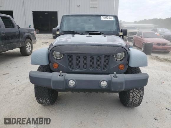 2011 Jeep Wrangler Rubicon with VIN 1J4BA6D15BL585388, listed as a Copart auction lot 76272184 with 119,043 mi miles and Clean title. Bid and sale history available at DreamBid. Image 5.