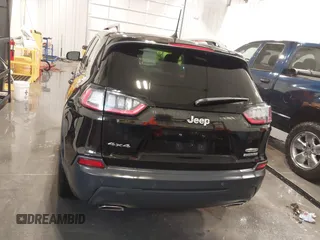 2021 Jeep Cherokee Latitude Lux with VIN 1C4PJMMX2MD107902, listed as a IAAI auction lot 41229913 with 61,195 mi miles and . Bid and sale history available at DreamBid. Image 16.
