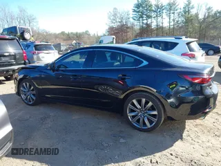 2018 Mazda 6 Grand Touring with VIN JM1GL1TY0J1319083, listed as a IAAI auction lot 40852818 with 57,408 mi miles and . Bid and sale history available at DreamBid. Image 14.