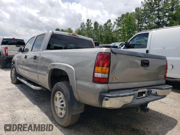 2003 GMC Sierra 1500HD SLE z VIN 1GTGC13U73F105405, wystawiony jako Copart lot #76817714 z przebiegiem 213 665 mil mil oraz Szkody całkowita. Historia ofert i sprzedaży dostępna na DreamBid. Obrazek 2.