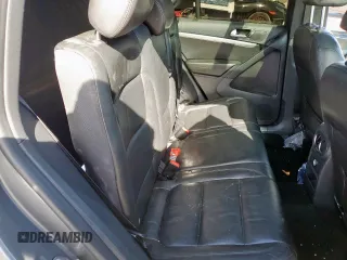 2014 Volkswagen Tiguan SEL z VIN WVGAV3AX6EW030705, wystawiony jako Copart lot #52156805 z przebiegiem 142 377 mil mil oraz Szkoda całkowita • Salvage title. Historia ofert i sprzedaży dostępna na DreamBid. Obrazek 11.