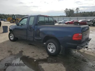 2003 Ford F-150 XL with VIN 1FTRX07273KB66549, listed as a Copart auction lot 83552004 with 205,026 mi miles and Salvage title. Bid and sale history available at DreamBid. Image 2.