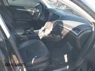 2016 Ford Fusion Titanium with VIN 3FA6P0K95GR135766, listed as a IAAI auction lot 41735040 with 99,256 mi miles. Bid and sale history available at carsss.com. Image 5.