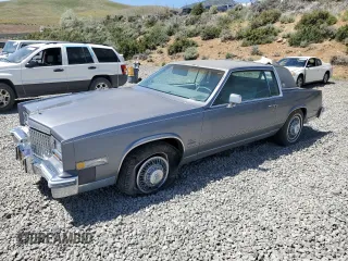 1980 Cadillac Eldorado z VIN 6L578AE609480, wystawiony jako Copart lot #58422345 z przebiegiem 85 604 mil mil oraz Tytuł czysty. Historia ofert i sprzedaży dostępna na DreamBid. Obrazek 1.