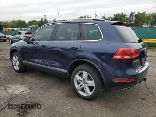 2011 Volkswagen Touareg Lux z VIN WVGFK9BP4BD001551, wystawiony jako Copart lot #58743065 z przebiegiem 142 661 mil mil oraz Szkoda całkowita • Salvage title. Historia ofert i sprzedaży dostępna na DreamBid. Obrazek 2.