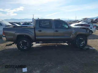 2014 Toyota Tacoma with VIN 3TMLU4EN3EM143882, listed as a IAAI auction lot 40657975 with 125,008 mi miles. Bid and sale history available at carsss.com. Image 13.