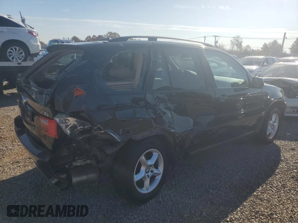 2003 BMW X5 3.0i with VIN 5UXFA53563LV96891, listed as a Copart auction lot 77636084 with 0 mi miles and Salvage Title. Bid and sale history available at carsss.com. Image 3.
