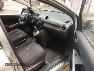 2012 Mazda 2 Sport with VIN JM1DE1KZ0C0149808, listed as a IAAI auction lot 42233078 with 166,111 mi miles and . Bid and sale history available at DreamBid. Image 5.