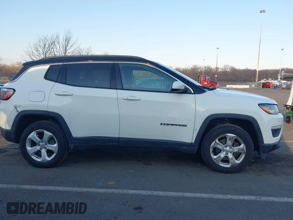 2019 Jeep Compass Latitude with VIN 3C4NJDBB4KT714079, listed as a IAAI auction lot 41317866 with 76,601 mi miles and . Bid and sale history available at DreamBid. Image 12.