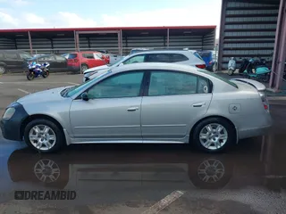 2006 Nissan Altima 2.5 S with VIN 1N4AL11EX6N303185, listed as a IAAI auction lot 41423674 with 240,388 mi miles. Bid and sale history available at carsss.com. Image 14.