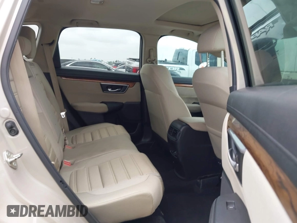 2018 Honda CR-V EX with VIN 5J6RW2H55JL003049, listed as a IAAI auction lot 41936542 with 79,057 mi miles and . Bid and sale history available at DreamBid. Image 8.
