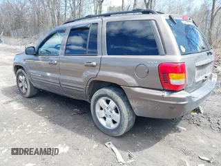 2001 Jeep Grand Cherokee Limited with VIN 1J4GW58N71C587088, listed as a IAAI auction lot 41973901 with 207,075 mi miles. Bid and sale history available at carsss.com. Image 3.
