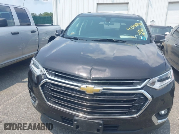 2019 Chevrolet Traverse LT Cloth z VIN 1GNEVGKW3KJ102804, wystawiony jako IAAI lot #42492949 z przebiegiem 144 895 mil mil oraz . Historia ofert i sprzedaży dostępna na DreamBid. Obrazek 12.