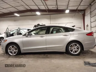 2018 Ford Fusion SE with VIN 3FA6P0HD1JR243112, listed as a IAAI auction lot 42256676 with 112,003 mi miles and . Bid and sale history available at DreamBid. Image 15.
