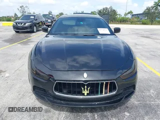 2015 Maserati Ghibli with VIN ZAM57XSA1F1144073, listed as a IAAI auction lot 42770723 with 105,782 mi miles and . Bid and sale history available at DreamBid. Image 6.