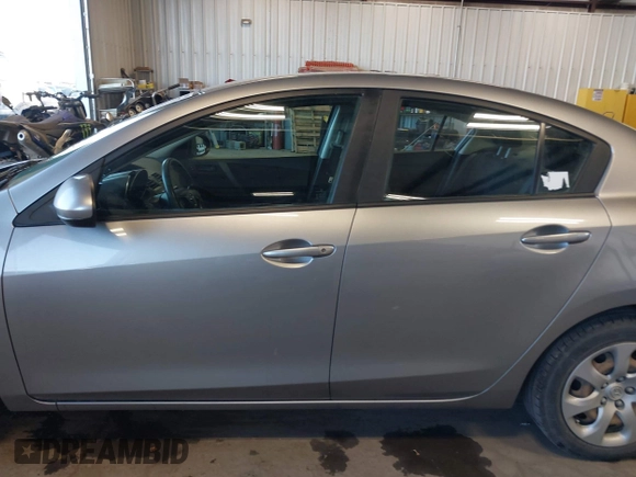 2011 Mazda Mazda3 i Sport with VIN JM1BL1UG2B1492573, listed as a IAAI auction lot 41718773 with 151,593 mi miles. Bid and sale history available at carsss.com. Image 14.