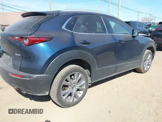 2024 Mazda CX-30 S Preferred with VIN 3MVDMBCM2RM720246, listed as a IAAI auction lot 41800330 with 6,743 mi miles and . Bid and sale history available at DreamBid. Image 4.
