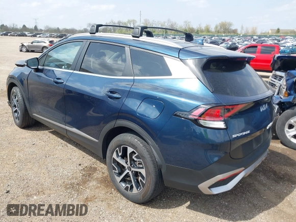 2023 Kia Sportage EX with VIN KNDPVCAGXP7104090, listed as a IAAI auction lot 42144158 with 26,983 mi miles and . Bid and sale history available at DreamBid. Image 3.