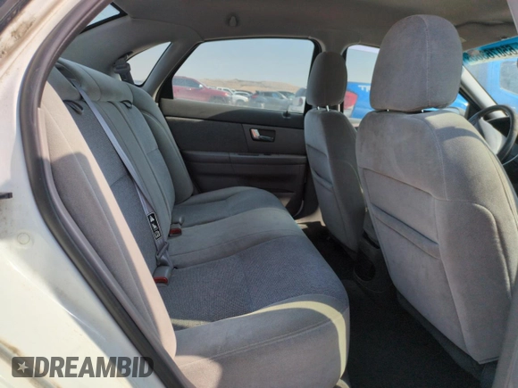 2000 Ford Taurus SE with VIN 1FAFP53U8YA106614, listed as a Copart auction lot 65076365 with 76,831 mi miles and Clean title. Bid and sale history available at DreamBid. Image 10.
