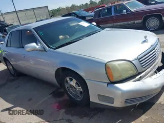 2002 Cadillac DeVille with VIN 1G6KD54Y32U182821, listed as a IAAI auction lot 41724570 with 142,421 mi miles. Bid and sale history available at carsss.com. Image 1.