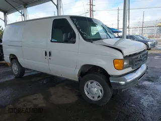 2005 Ford Econoline Cargo with VIN 1FTNE24L25HA10061, listed as a IAAI auction lot 41566517 with 247,777 mi miles. Bid and sale history available at carsss.com. Image 1.