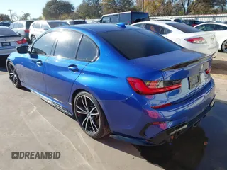 2020 BMW 3 Series M340i xDrive with VIN WBA5U9C06LFH24903, listed as a IAAI auction lot 41041530 with 55,949 mi miles and . Bid and sale history available at DreamBid. Image 3.